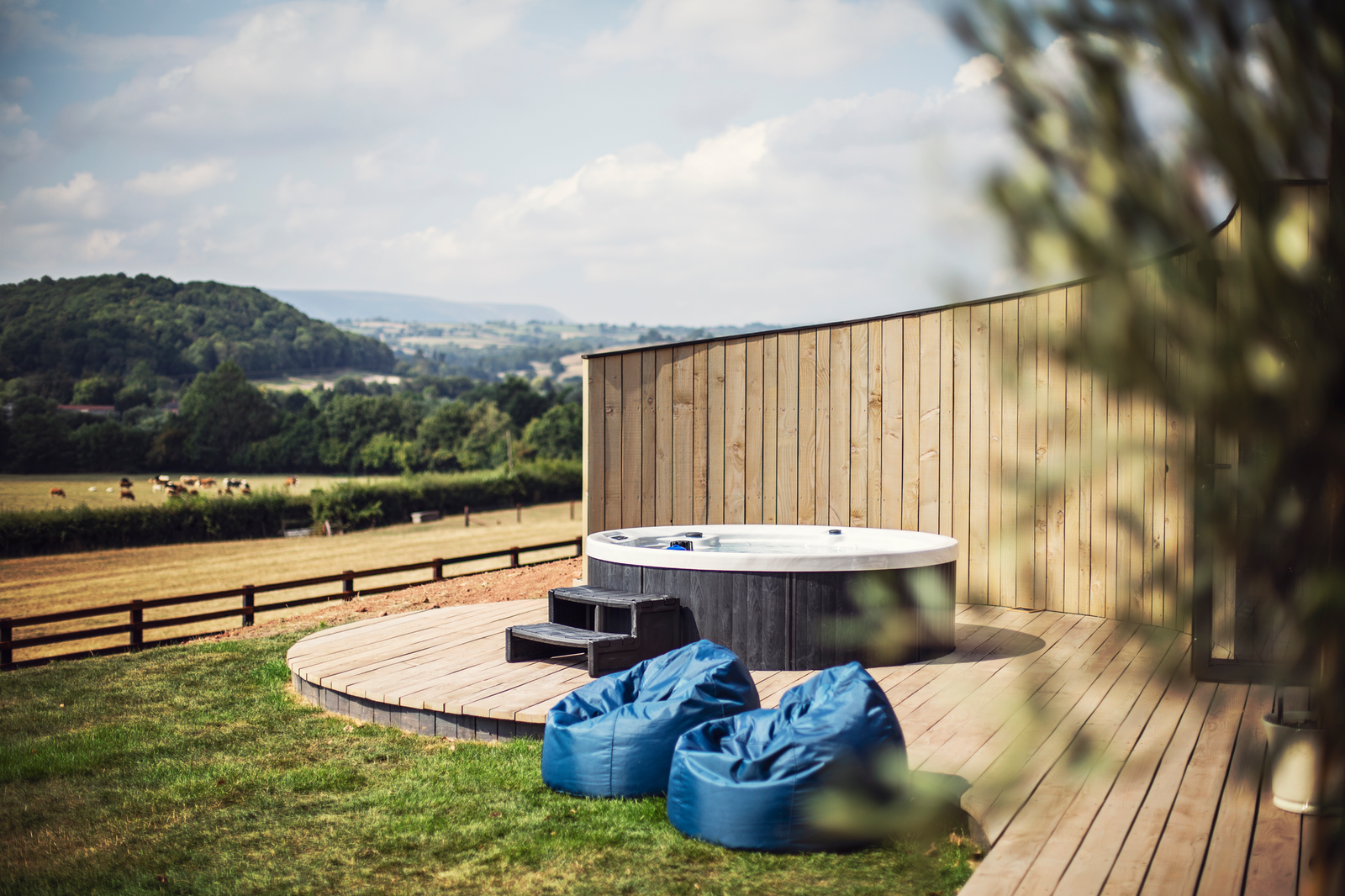 Private lodge hot tub and bean bags overlooking the countryside